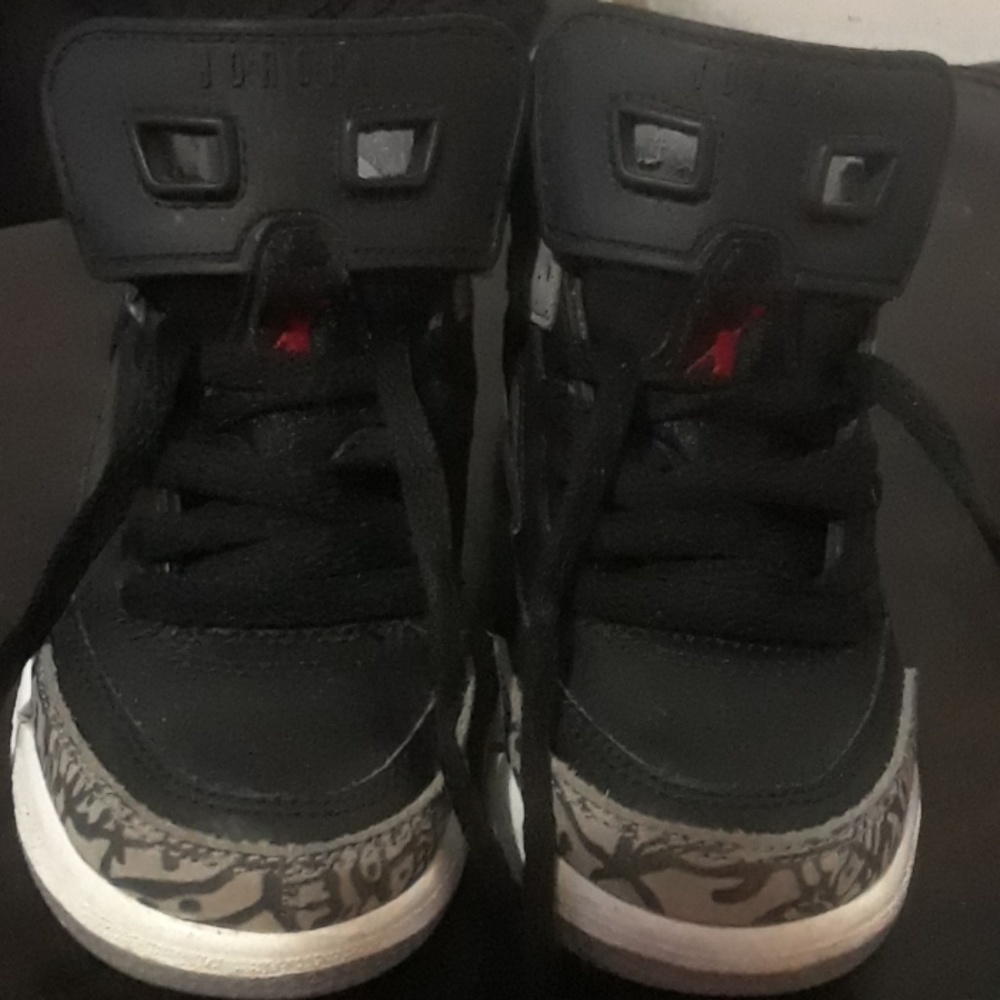 Black and grey Jordans